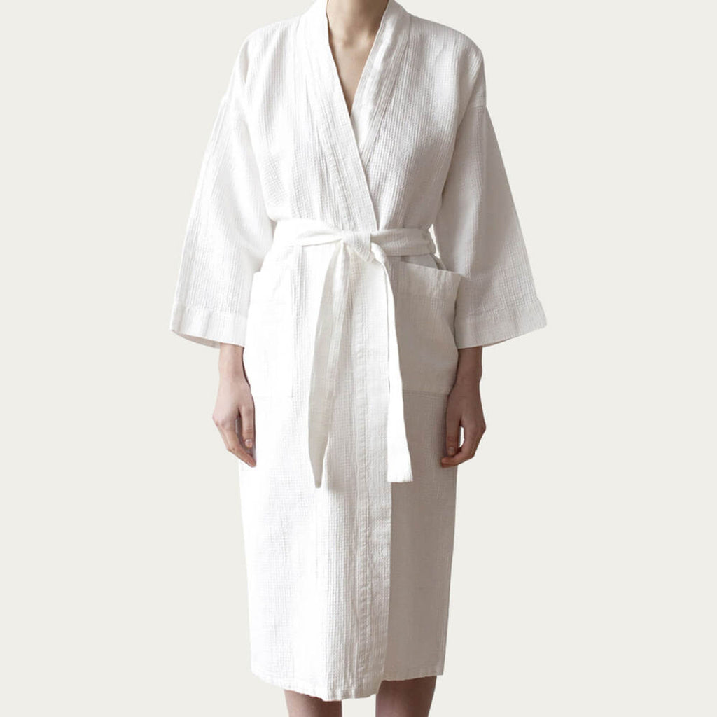 Linen Tales white robe on model, front view