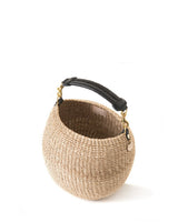 Clare V. tan woven basket purse, top view