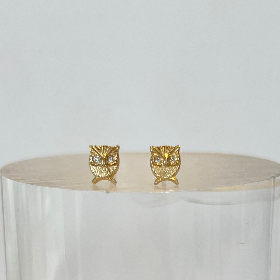 Victoria Cunningham gold owl stud earrings with diamond, front view