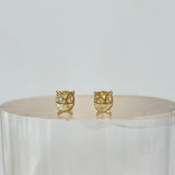 Victoria Cunningham gold owl stud earrings with diamond, front view