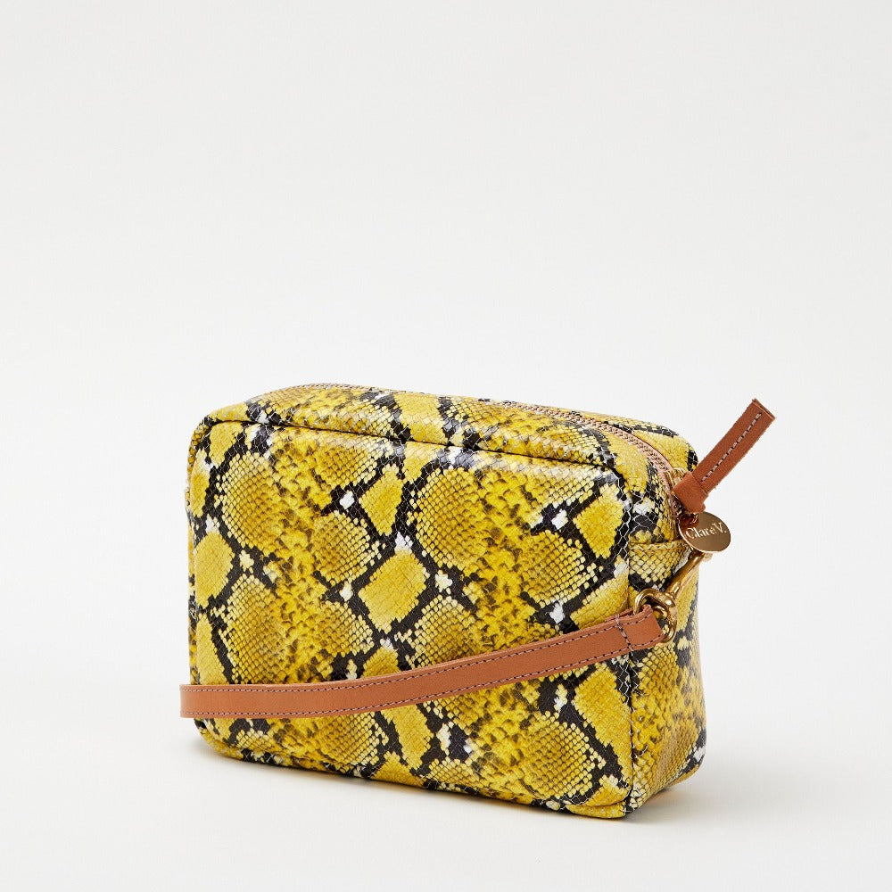 Clare V. yellow leather snake print angled front view