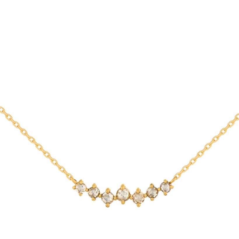 Celine D'aoust gold necklace with diamond bar, front view