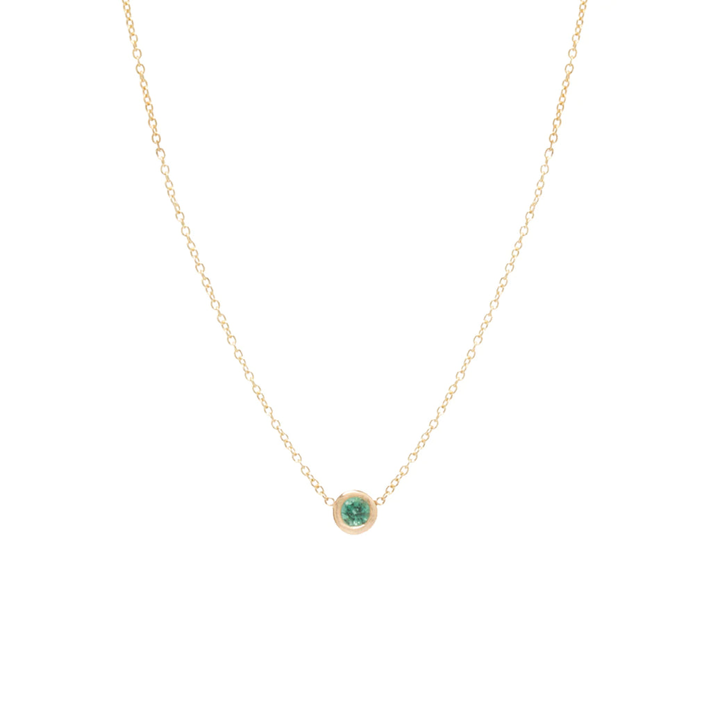 Zoe Chicco gold necklace with emerald, front view