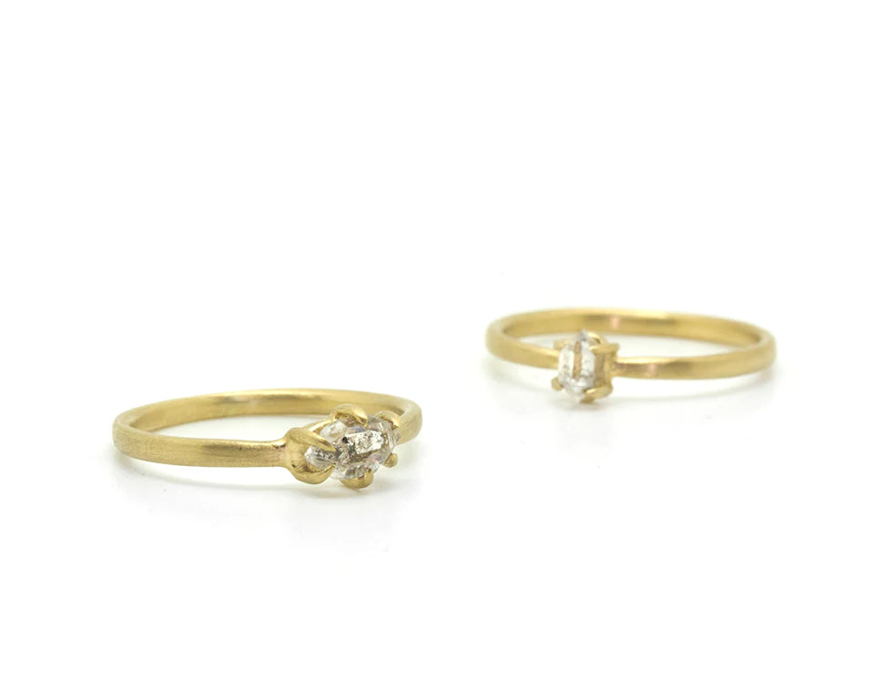 Hannah Blount gold rings with herkimer diamonds, angled front view