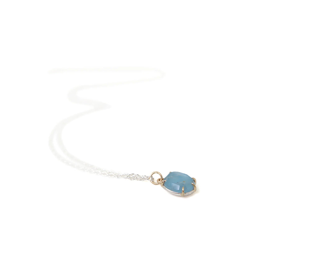 Hannah Blount sterling silver and gold necklace with aquamarine, angled front view