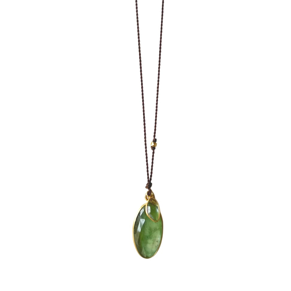 Margaret Solow nylon cord necklace with tourmaline and sapphire, front view