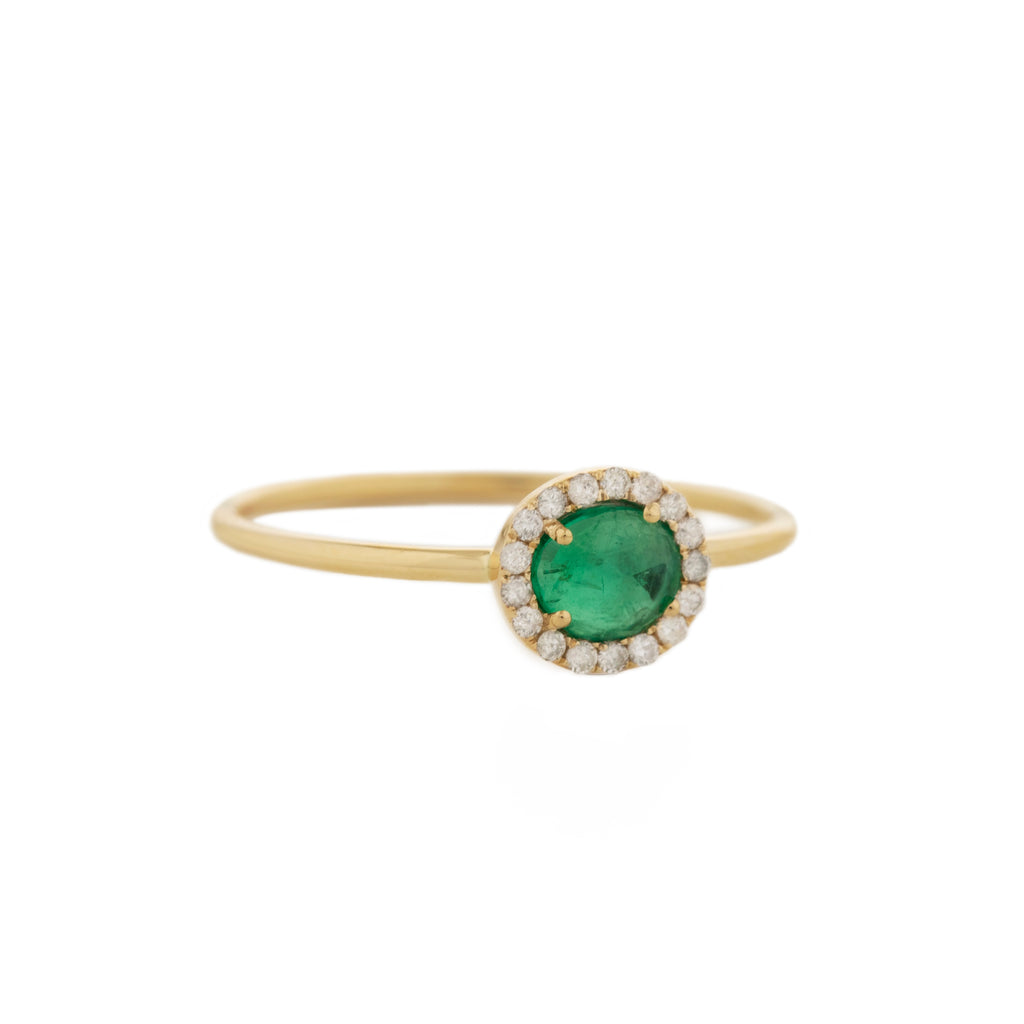 Celine D'aoust gold ring with emerald stone and diamonds, front view