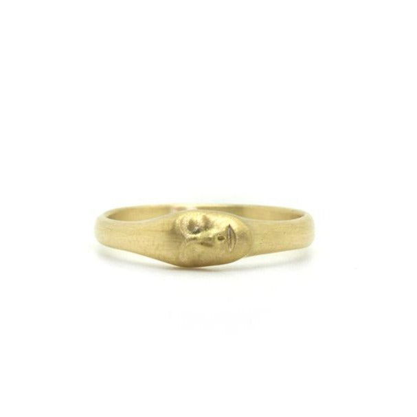 Hannah Blount gold ring with engraved face, front view