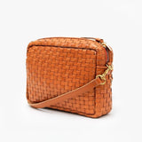Clare V. brown leather woven purse, angled side view
