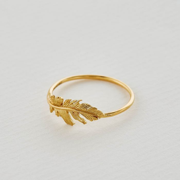 Alex Monroe gold ring with feather detail, angled top view