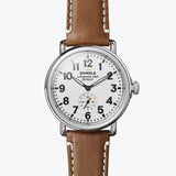 Shinola white face stainless steel watch brown leather strap, front view