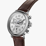 Shinola silver watch stainless steel with brown leather strap, angled front view