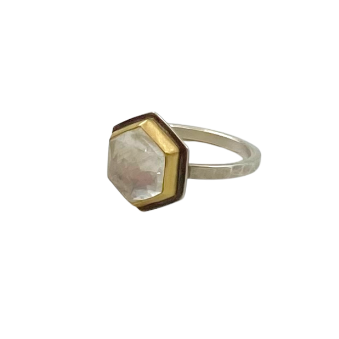 Ananda Khalsa silver ring with hexagon moonstone and gold, angled front view