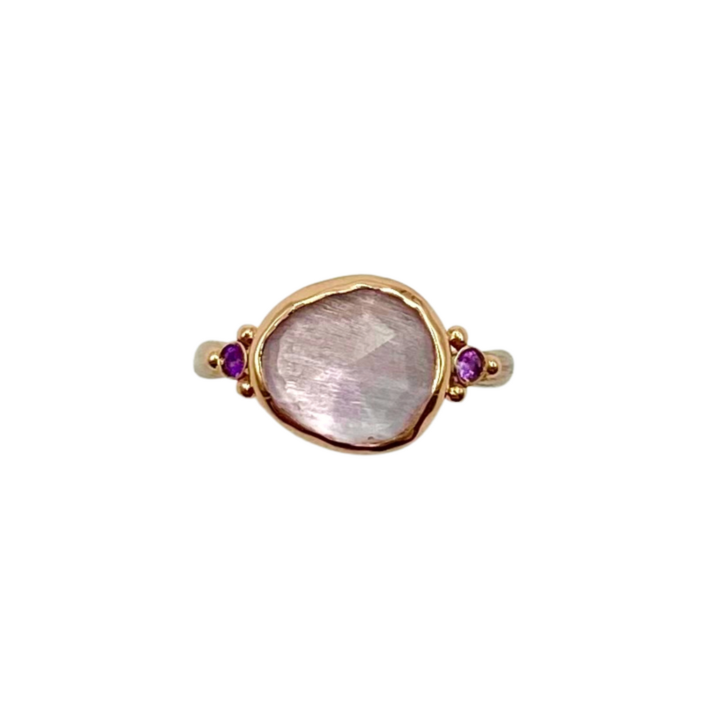 Emily Amey gold ring with center and side amethyst, front view