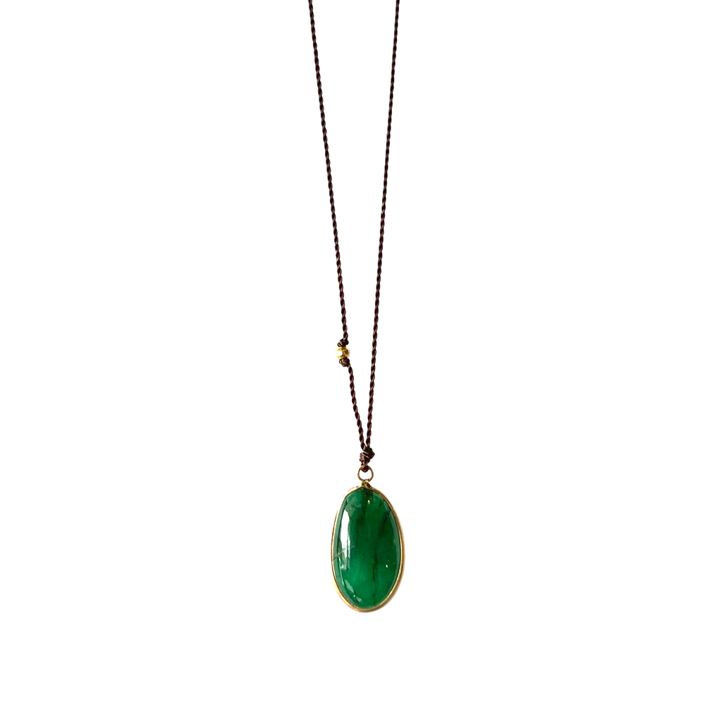 Margaret Solow nylon cord necklace with emerald, front view