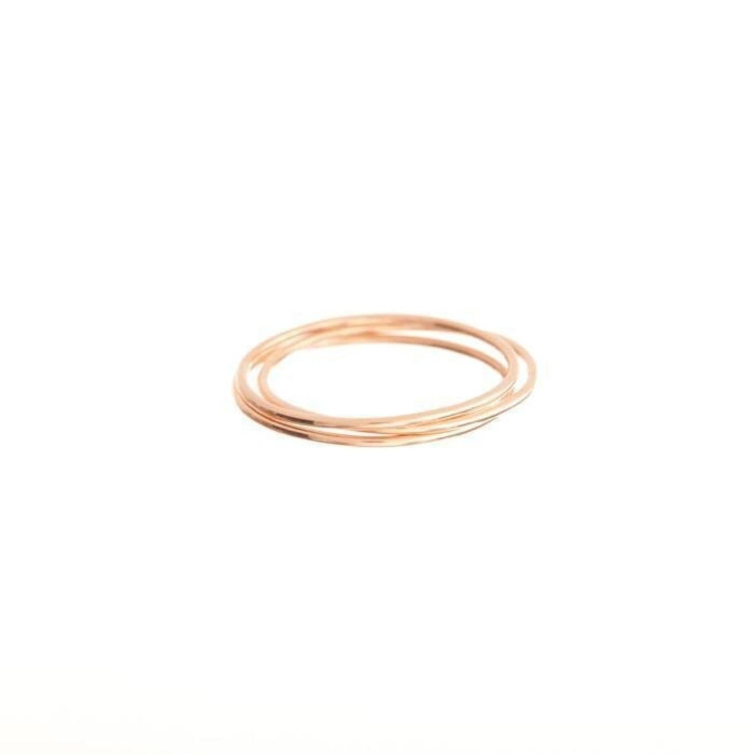 A few thin gold bands grouped together.