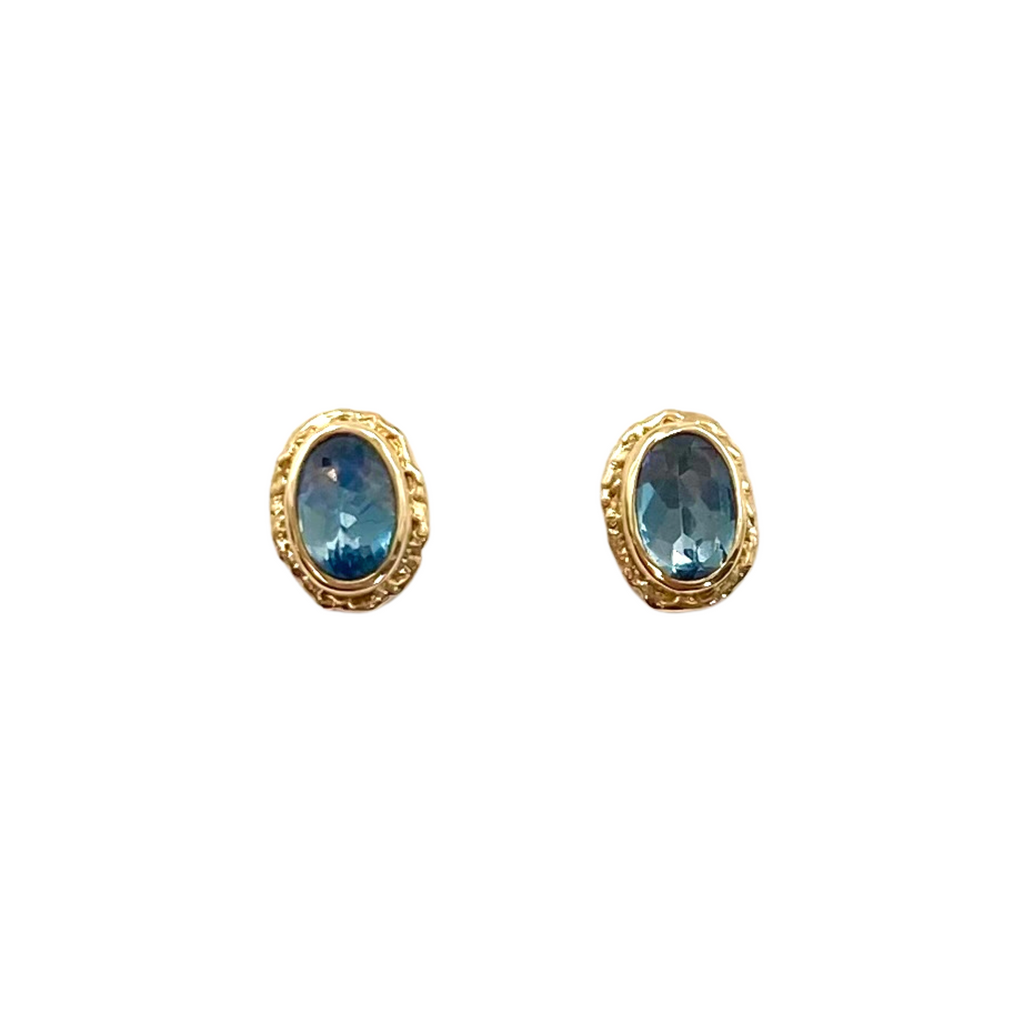 Jamie Joseph blue topaz oval stud earrings with gold, front view