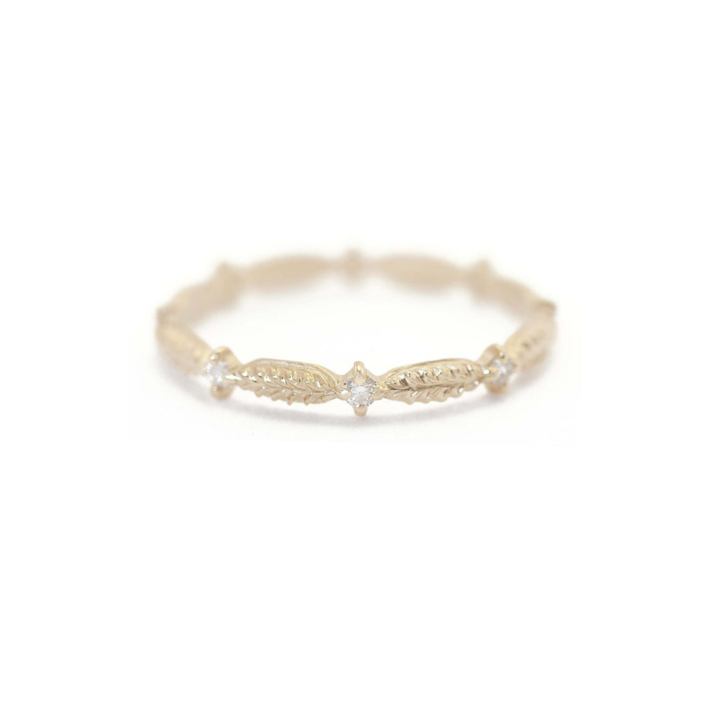 Megan Thorne gold band with leaf texture and diamonds, front view