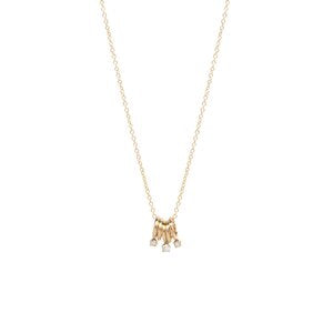 Zoe Chicco gold necklace with 5 tiny rings and 3 diamonds, front view