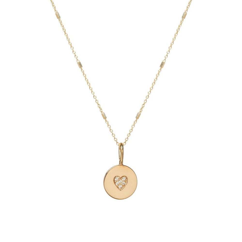 Zoe Chicco gold necklace with heart charm and diamonds, front view