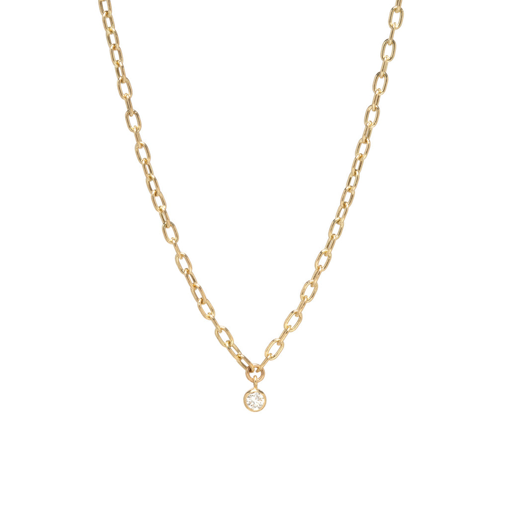 Zoe Chicco gold chain necklace with dangling diamond, front view