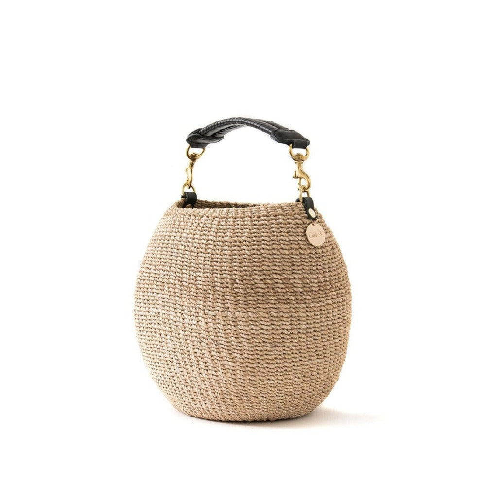 Clare V. woven tan basket purse, angled front view