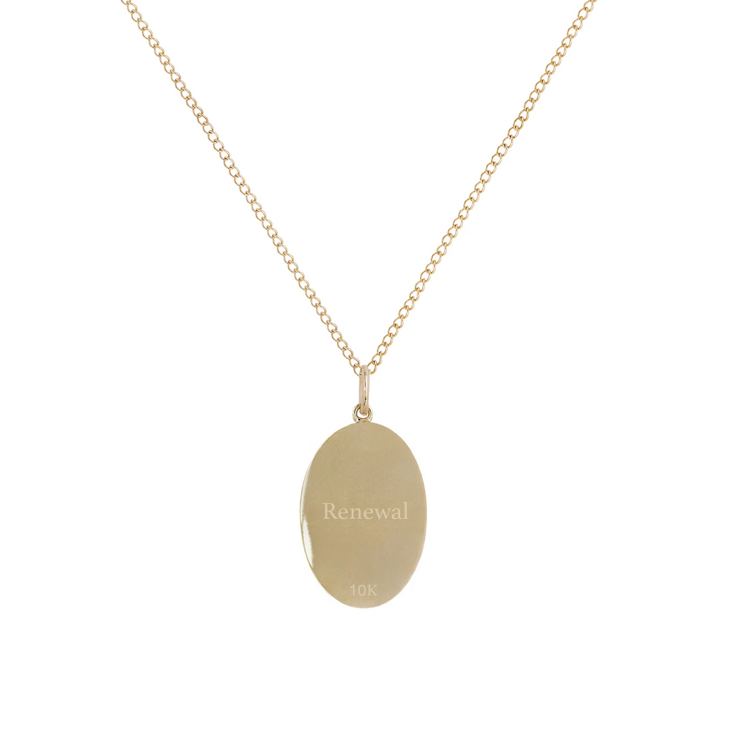 Zahava gold necklace with pendant engraved with renewal text, back view