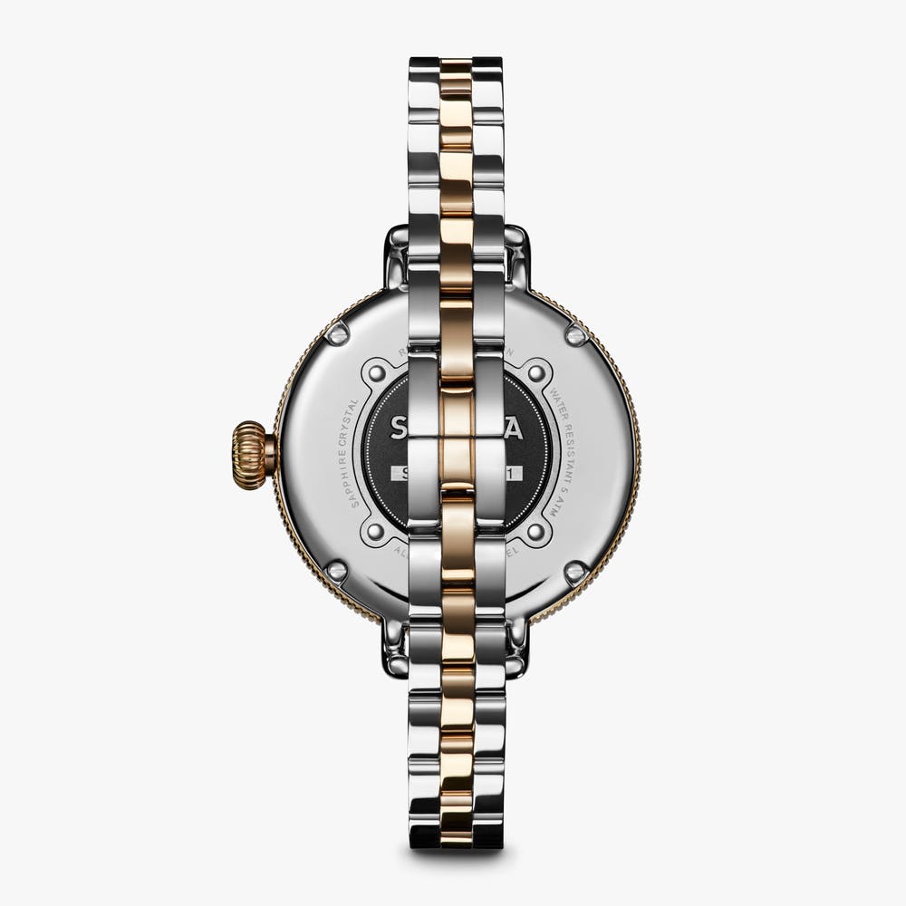 Shinola stainless steel silver and gold watch, back view