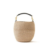 Clare V. woven tan basket purse, front view