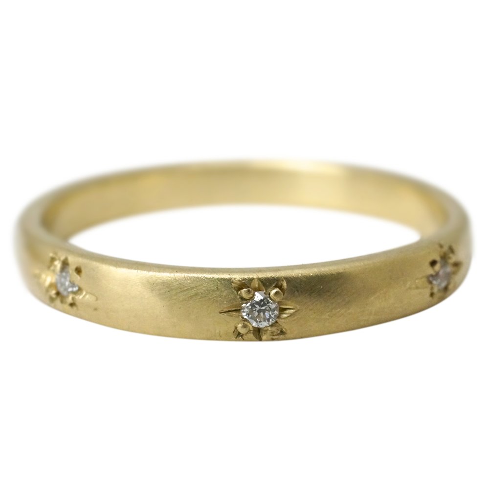 Sarah Swell gold band with diamonds, front view
