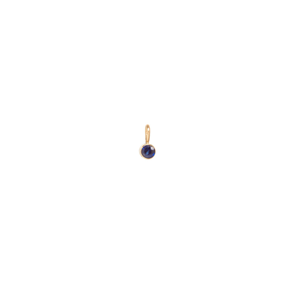 Zoe Chicco gold charm with blue sapphire, front view