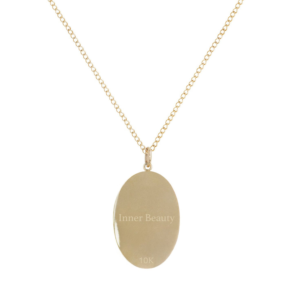 Zahava gold necklace with pendant engraved with inner beauty text, back view