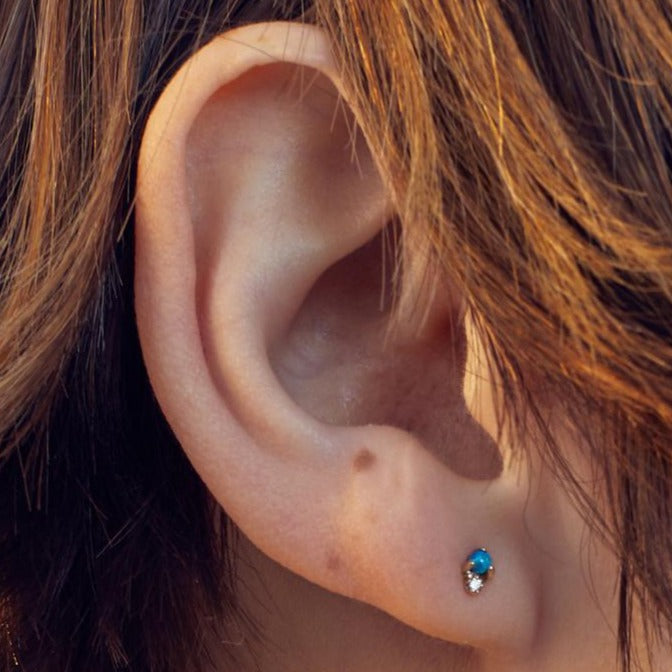 Wwake gold stud earring with opal and diamond, front view