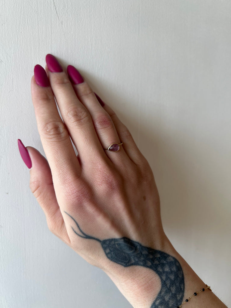 Margaret Solow gold ring with amethyst on model, top view